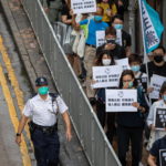 Le proteste dei pan-democratici a Hong Kong delimitate dalle transenne